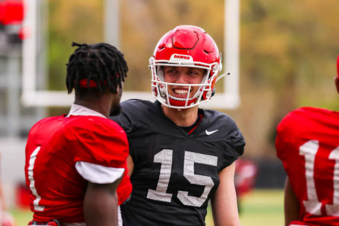 Carson Beck Talks to Marcus Rosemy-Jacksaint at Practice Credit: Tony Walsh/UGAAA